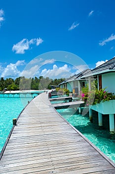 Beautiful beach with white sand. ocean, blue sky with clouds. Sunny day.