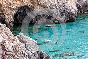 Beautiful beaches of Greece - Tsigrado, Milos island photo