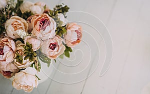 Beautiful beige flower bouquet on the flloor