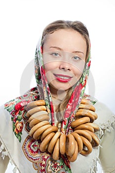 Beautiful belarusian woman with bread-rings photo