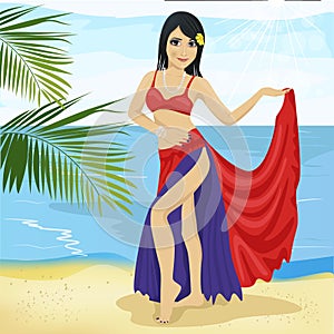Beautiful belly dancer asian woman in a red and blue stage costume on beach