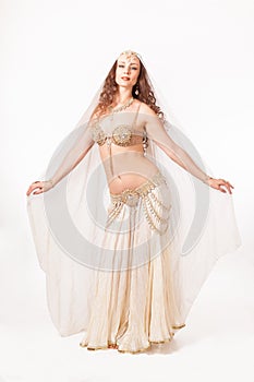 Beautiful belly dancer in madonna pose
