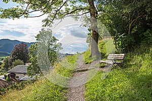 beautiful bench beside footpath up to Weinberg hill, Schliersee tourist resort