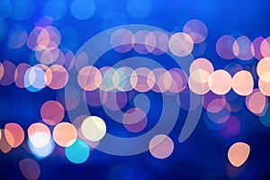 Beautiful big city blurring lights abstract circular bokeh blue