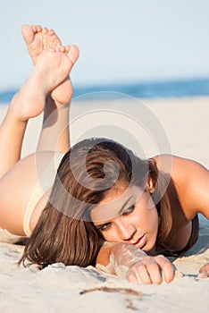 Beautiful bikini model posing on the beach
