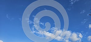 Beautiful billowing clouds (cumulus) in the deep blue sky.