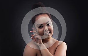 Beautiful black african woman face studio portrait