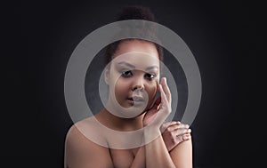 Beautiful black african woman face studio portrait