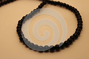 Beautiful black beads in a row