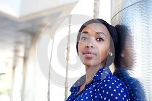 Beautiful black business woman in blue shirt