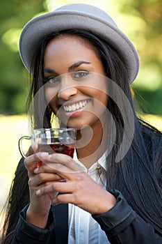 Beautiful Black Girl Drinking Tea Outdoors