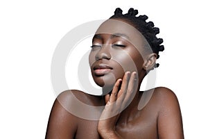 Beautiful black girl touching face photo