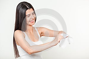 Beautiful black hair young women cleaning hands with wet wipes