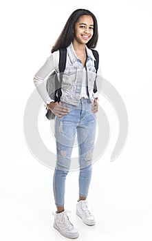Beautiful black school girl posing on studio white background with backpack