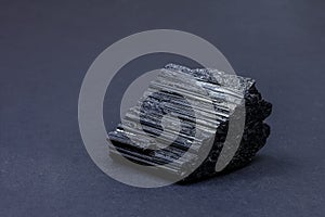 Beautiful black tourmaline on a black background