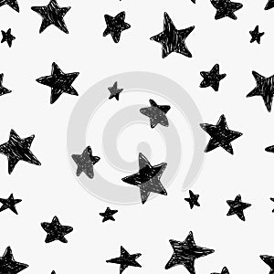 Beautiful black and white seamless night sky pattern with doodle textured stars, hand drawn.