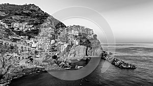 Beautiful black and white view of the village of Manarola at sunset, Cinque Terre, Liguria, Italy