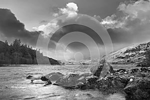 Beautiful black and white Winter landscape image of Llynnau Mym