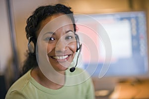 Beautiful black woman with headset photo