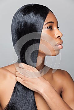 Beautiful black woman with long straight hair