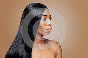 Beautiful black woman with long straight hair