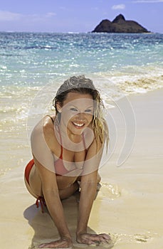 Beautiful blond in bikini on beach