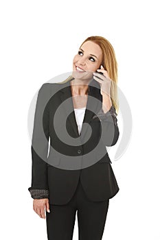 Beautiful blond businesswoman talking on mobile phone smiling happy and confident