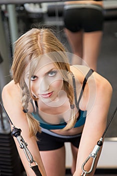 Beautiful blond caucasian woman exercising