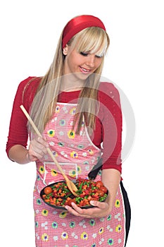 Beautiful blond girl cooking