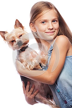 Beautiful blond girl with cute yorkshire terrier dog