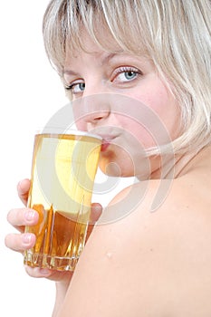 Beautiful blond girl drinking beer