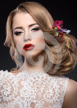 Beautiful blond girl in image of the bride with