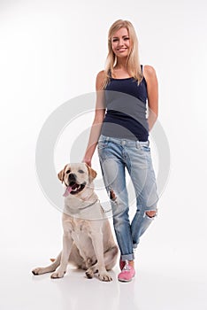 Beautiful blond girl with Labrador Retriever