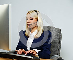 Beautiful blond help desk office woman
