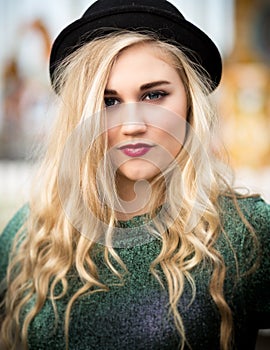 Beautiful Blond Teenage Girl in a Bowler Hat