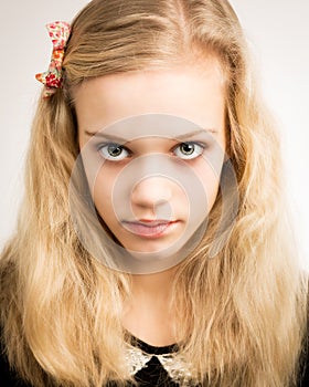 Beautiful Blond Teenage Girl Looking In The Camera