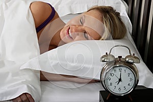 Beautiful Blond Woman Asleep in Bed