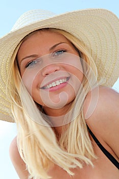 Beautiful blond woman at the beach