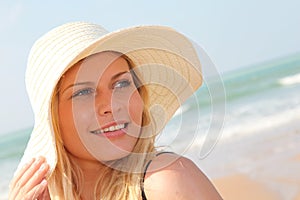 Beautiful blond woman at the beach