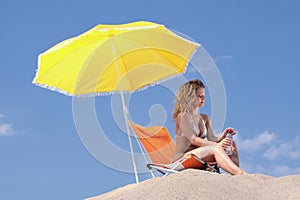 Beautiful blond woman in bikini