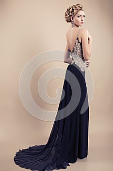 beautiful blond woman in elegant black dress