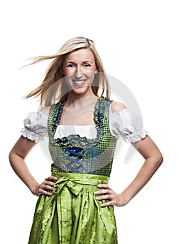 Beautiful blond woman in a traditional dirndl