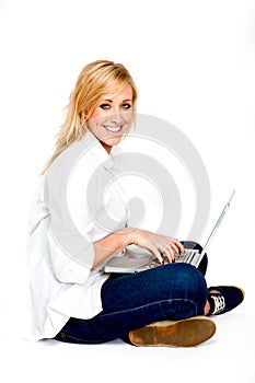 Beautiful Blond Woman Typing on laptop