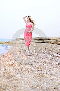 Beautiful blonde ashore epidemic deathes in rose gown