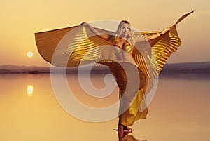 Beautiful blonde belly dancer woman