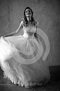 Beautiful blonde bride woman in a gorgeous wedding dress, fashion beauty portrait