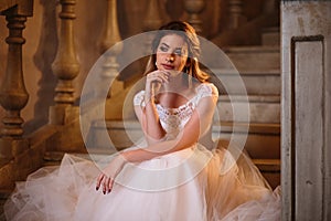 Beautiful blonde bride woman in a gorgeous wedding dress, fashion beauty portrait