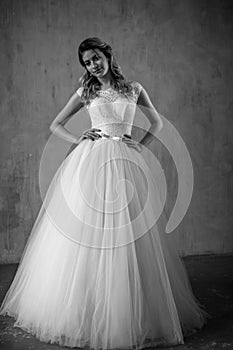 Beautiful blonde bride woman in a gorgeous wedding dress, fashion beauty portrait