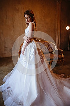 Beautiful blonde bride woman in a gorgeous wedding dress, fashion beauty portrait