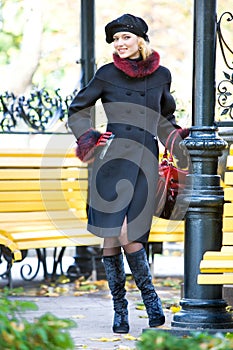 Beautiful blonde in coat and hat